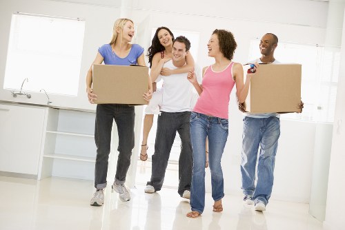 Removal team pricing a move for a compact apartment in West Kensington