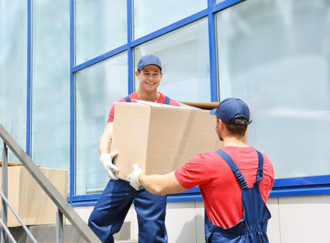 Mover loading boxes for same day removals in West Kensington