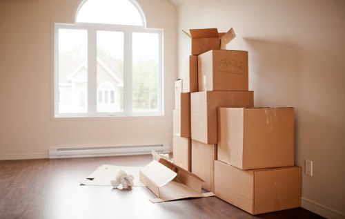 Checklist and packed boxes illustrating home move planning in Westkensington